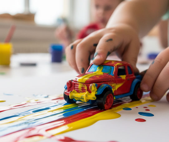 Kids creating with salad spinner